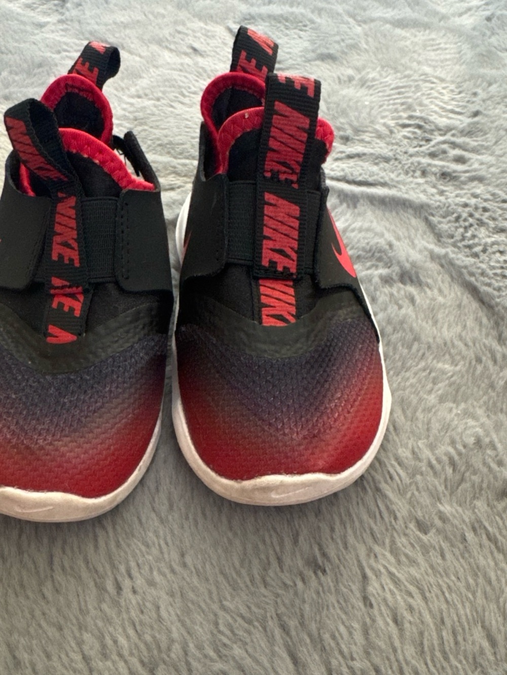 Nike Kids Gradient Red and Black Slip-On Sneakers